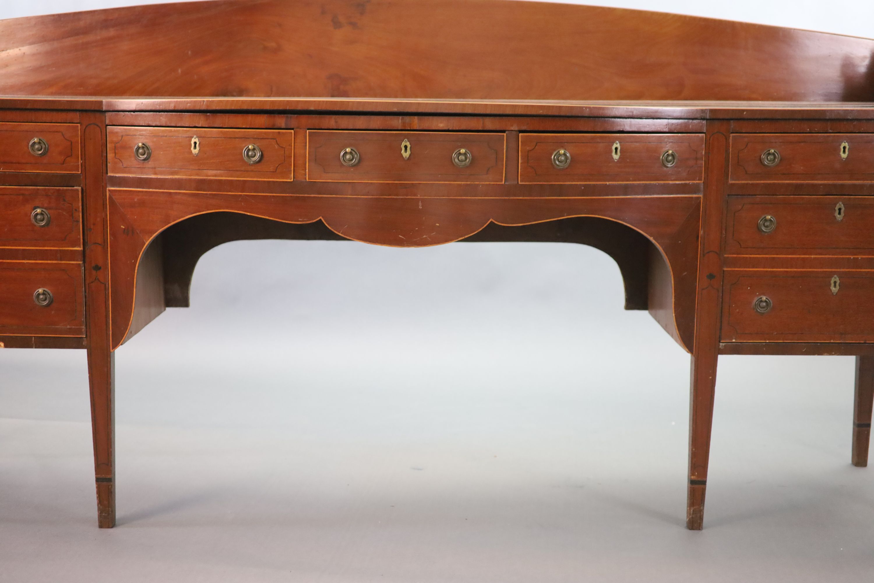 A Regency boxwood strung mahogany bowfront sideboard, W.241cm D.63cm H.118cm